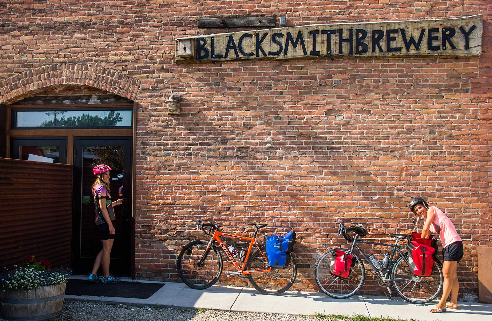 Cyclists stop for a beer at Blacksmith Brewery on the Bitterroot Trail in Stevensville