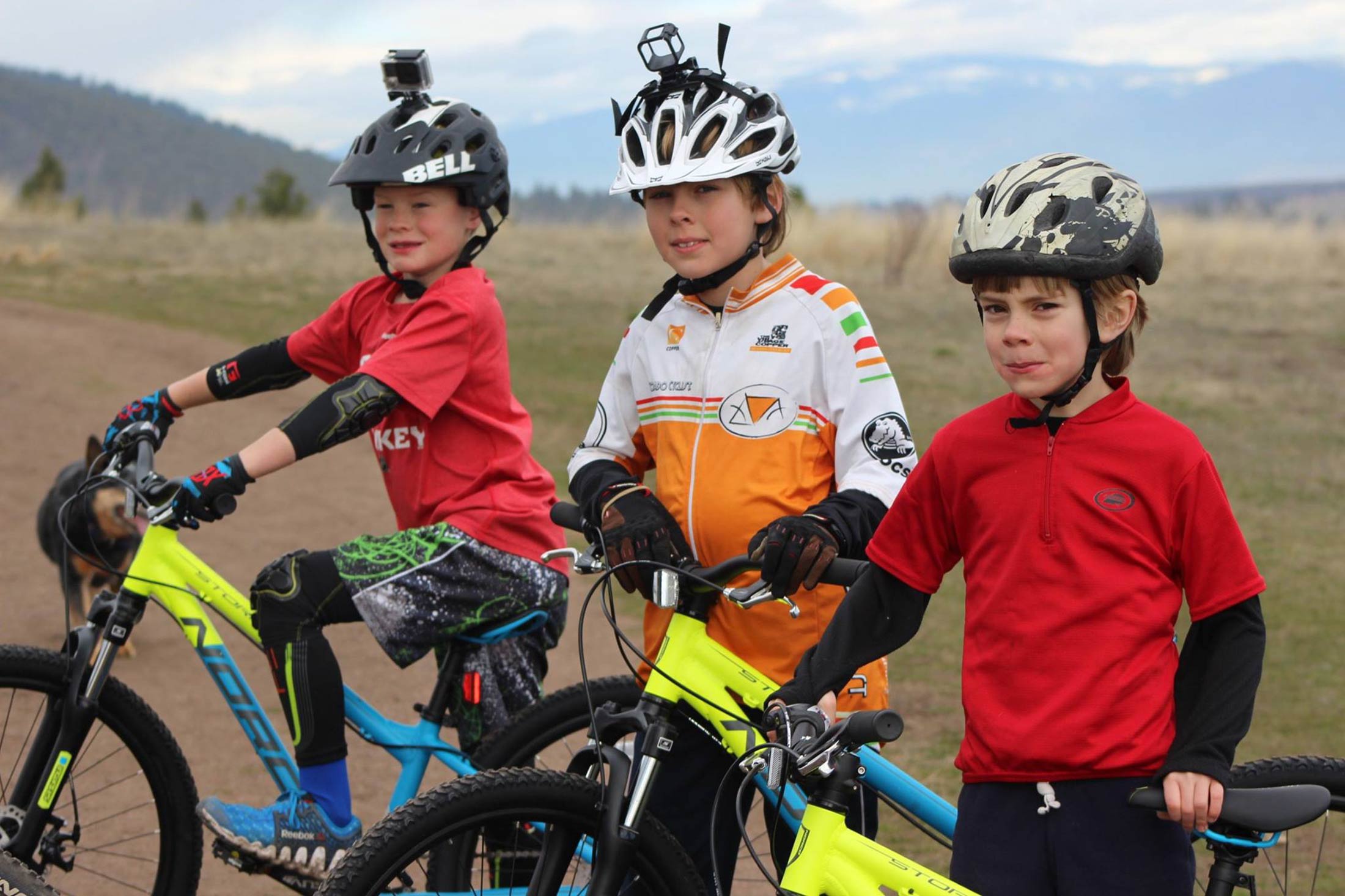 Young cyclists pose for a photo on the Bitterroot Trail